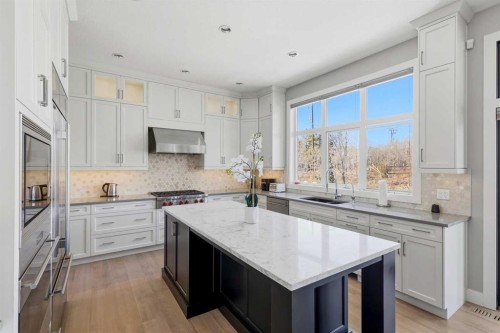75 Aspen Summit Court Sw, Calgary, AB - Indoor Photo Showing Kitchen With Double Sink With Upgraded Kitchen