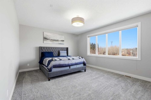 75 Aspen Summit Court Sw, Calgary, AB - Indoor Photo Showing Bedroom