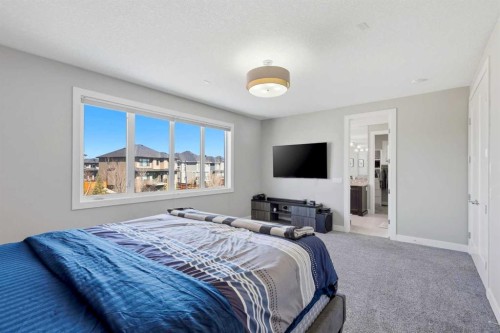 75 Aspen Summit Court Sw, Calgary, AB - Indoor Photo Showing Bedroom