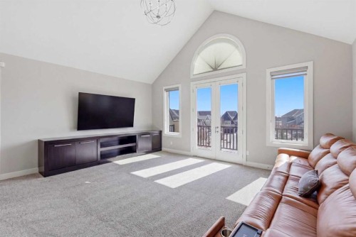 75 Aspen Summit Court Sw, Calgary, AB - Indoor Photo Showing Living Room