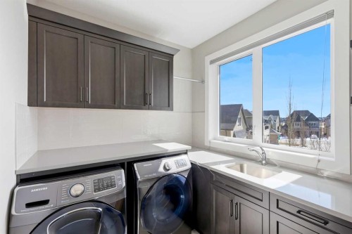 75 Aspen Summit Court Sw, Calgary, AB - Indoor Photo Showing Laundry Room