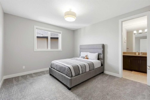 75 Aspen Summit Court Sw, Calgary, AB - Indoor Photo Showing Bedroom