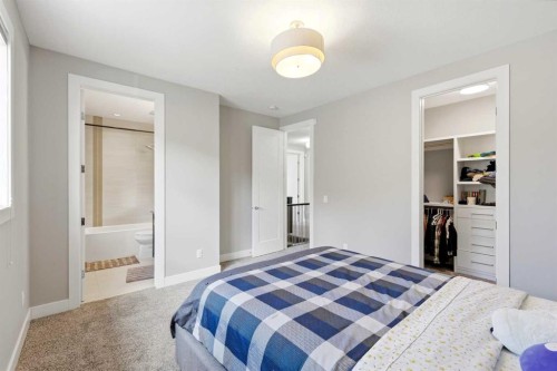 75 Aspen Summit Court Sw, Calgary, AB - Indoor Photo Showing Bedroom