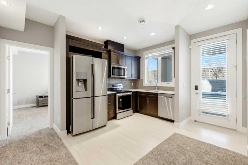 75 Aspen Summit Court Sw, Calgary, AB - Indoor Photo Showing Kitchen With Stainless Steel Kitchen