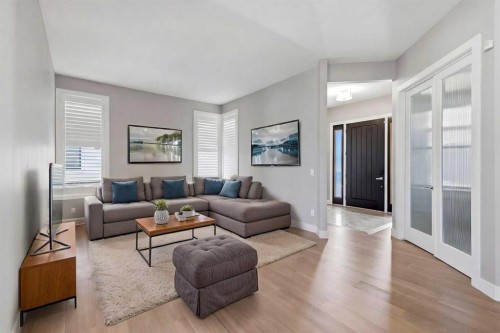 75 Aspen Summit Court Sw, Calgary, AB - Indoor Photo Showing Living Room
