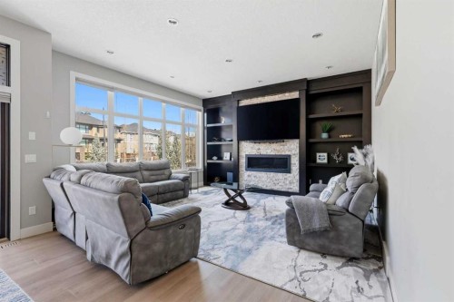 75 Aspen Summit Court Sw, Calgary, AB - Indoor Photo Showing Living Room With Fireplace