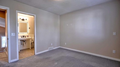 48 Riverbrook Road Se, Calgary, AB - Indoor Photo Showing Other Room