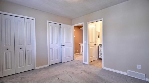 48 Riverbrook Road Se, Calgary, AB - Indoor Photo Showing Bedroom