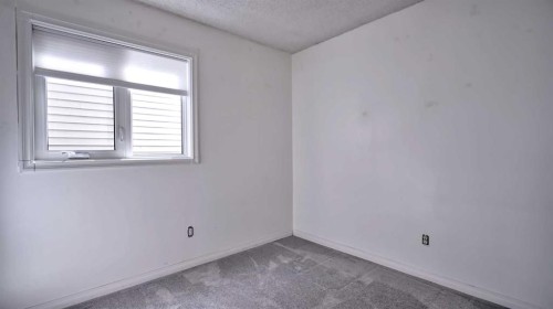 48 Riverbrook Road Se, Calgary, AB - Indoor Photo Showing Other Room