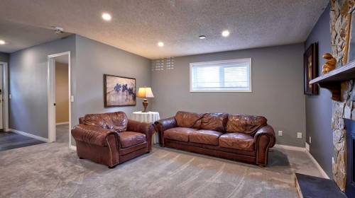 48 Riverbrook Road Se, Calgary, AB - Indoor Photo Showing Living Room