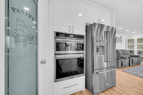 300 Taracove Estate Drive Ne, Calgary, AB - Indoor Photo Showing Kitchen With Upgraded Kitchen