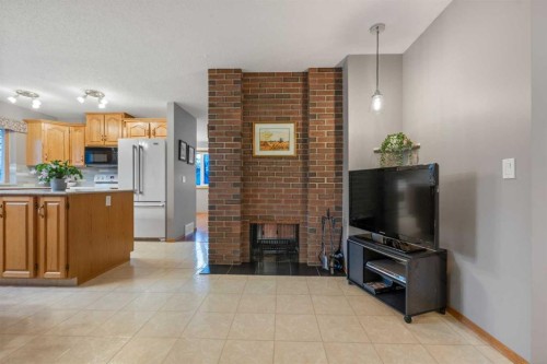 479 Templevale Drive Ne, Calgary, AB - Indoor With Fireplace
