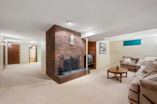 479 Templevale Drive Ne, Calgary, AB - Indoor With Fireplace