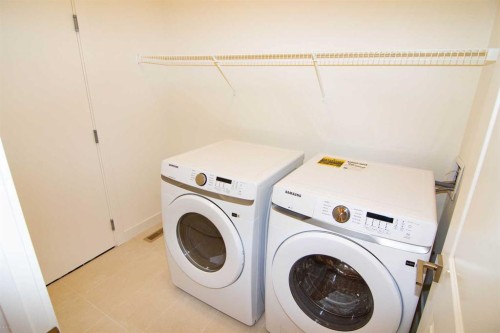 31 Wolf Crescent, Okotoks, AB - Indoor Photo Showing Laundry Room