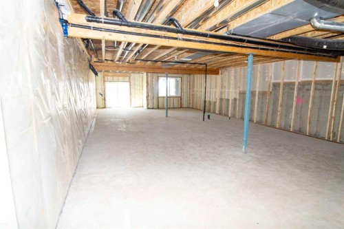 31 Wolf Crescent, Okotoks, AB - Indoor Photo Showing Basement