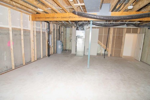31 Wolf Crescent, Okotoks, AB - Indoor Photo Showing Basement