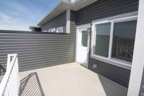 31 Wolf Crescent, Okotoks, AB - Outdoor With Exterior
