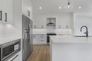 135 Walgrove Bay Se, Calgary, AB  - Indoor Photo Showing Kitchen With Stainless Steel Kitchen With Upgraded Kitchen 