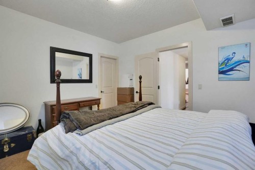 5107 Carney Road Nw, Calgary, AB - Indoor Photo Showing Bedroom