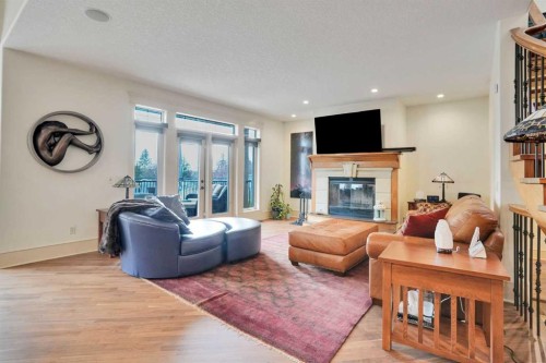 5107 Carney Road Nw, Calgary, AB - Indoor Photo Showing Living Room With Fireplace