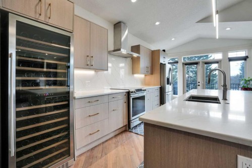 5107 Carney Road Nw, Calgary, AB - Indoor Photo Showing Kitchen With Stainless Steel Kitchen With Double Sink With Upgraded Kitchen