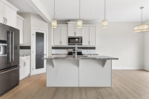 123 Evanscrest Way Nw, Calgary, AB - Indoor Photo Showing Kitchen With Stainless Steel Kitchen With Upgraded Kitchen