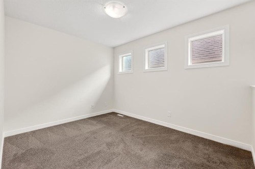 123 Evanscrest Way Nw, Calgary, AB - Indoor Photo Showing Other Room