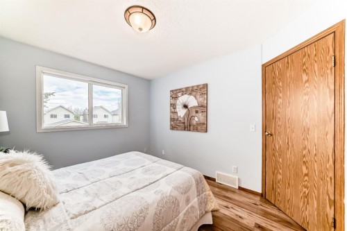 118 Bridleridge Way Sw, Calgary, AB - Indoor Photo Showing Bedroom