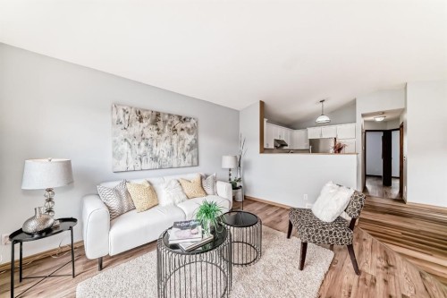 118 Bridleridge Way Sw, Calgary, AB - Indoor Photo Showing Living Room