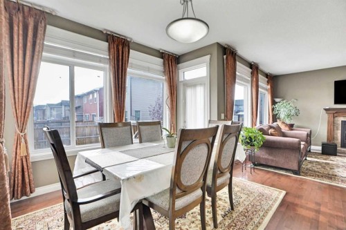 39 Skyview Shores Rise Ne, Calgary, AB - Indoor Photo Showing Dining Room With Fireplace
