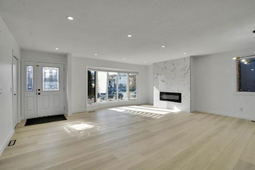 20 Templehill Crescent Ne, Calgary, AB - Indoor Photo Showing Living Room With Fireplace