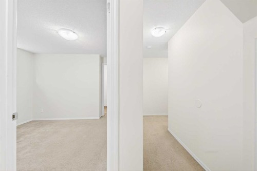 182 Covemeadow Close Ne, Calgary, AB - Indoor Photo Showing Other Room