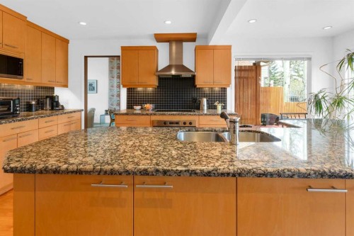 195 Ranch Estates Road Nw, Calgary, AB - Indoor Photo Showing Kitchen With Double Sink With Upgraded Kitchen