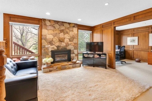 195 Ranch Estates Road Nw, Calgary, AB - Indoor Photo Showing Living Room With Fireplace