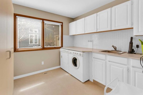 195 Ranch Estates Road Nw, Calgary, AB - Indoor Photo Showing Laundry Room