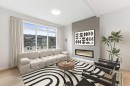 215 Waterford Heights, Chestermere, AB  - Indoor Photo Showing Living Room With Fireplace 