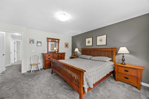 64 Arbour Ridge Way Nw, Calgary, AB - Indoor Photo Showing Bedroom
