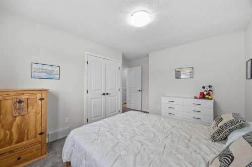 64 Arbour Ridge Way Nw, Calgary, AB - Indoor Photo Showing Bedroom