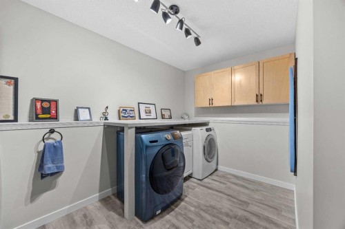 64 Arbour Ridge Way Nw, Calgary, AB - Indoor Photo Showing Laundry Room