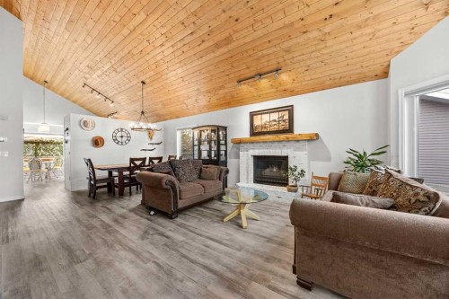 64 Arbour Ridge Way Nw, Calgary, AB - Indoor Photo Showing Living Room With Fireplace