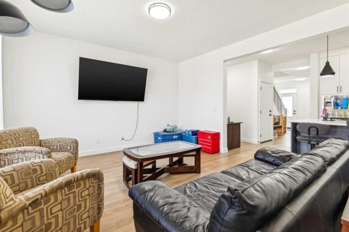 12 Copperhead Garden Se, Calgary, AB - Indoor Photo Showing Living Room