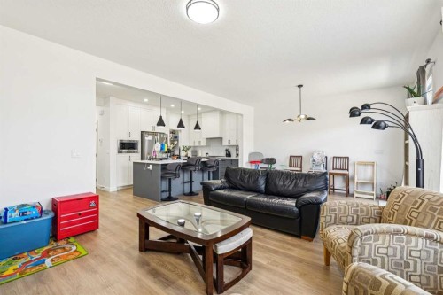12 Copperhead Garden Se, Calgary, AB - Indoor Photo Showing Living Room