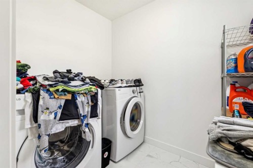 12 Copperhead Garden Se, Calgary, AB - Indoor Photo Showing Laundry Room
