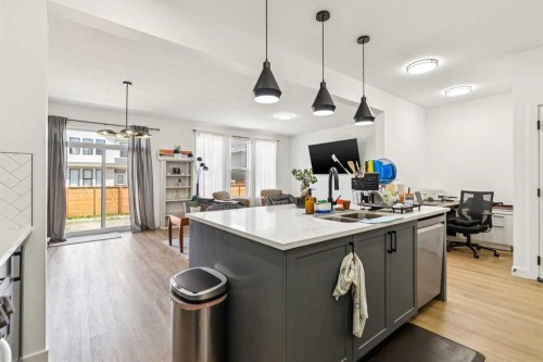 12 Copperhead Garden Se, Calgary, AB - Indoor Photo Showing Kitchen With Double Sink With Upgraded Kitchen