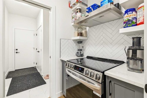 12 Copperhead Garden Se, Calgary, AB - Indoor Photo Showing Kitchen