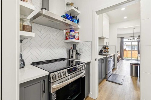 12 Copperhead Garden Se, Calgary, AB - Indoor Photo Showing Kitchen With Upgraded Kitchen