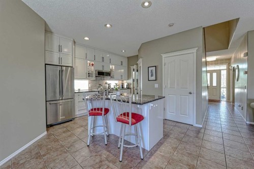 111 West Springs Way Sw, Calgary, AB - Indoor Photo Showing Kitchen With Stainless Steel Kitchen With Upgraded Kitchen