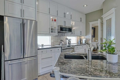 111 West Springs Way Sw, Calgary, AB - Indoor Photo Showing Kitchen With Stainless Steel Kitchen With Double Sink With Upgraded Kitchen