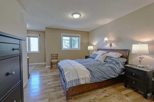 111 West Springs Way Sw, Calgary, AB - Indoor Photo Showing Bedroom