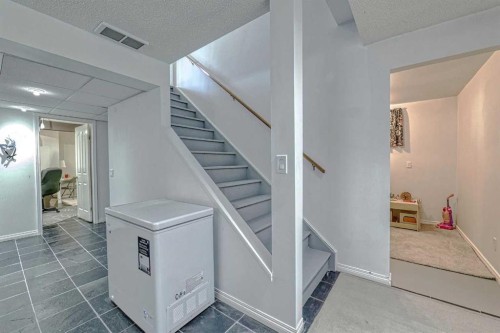 111 West Springs Way Sw, Calgary, AB - Indoor Photo Showing Other Room